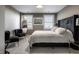 Inviting main bedroom with soft textures, large headboard, comfortable seating, and natural light at 350 N Meridian St # 606/607, Indianapolis, IN 46204