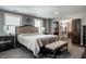 Spacious main bedroom with plush bedding, natural light, and access to a custom walk-in closet at 350 N Meridian St # 606/607, Indianapolis, IN 46204
