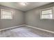 Bedroom featuring neutral-toned walls, carpeting, and natural light at 3513 Ireland Dr, Indianapolis, IN 46235
