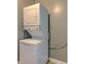 Laundry area featuring a stacked washer and dryer at 3513 Ireland Dr, Indianapolis, IN 46235