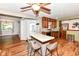 Eat-in kitchen featuring modern finishes, updated lighting, and an island at 3515 Lindenwald Dr, Indianapolis, IN 46217