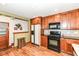 Updated kitchen with black appliances, modern backsplash, and ample cabinet space at 3515 Lindenwald Dr, Indianapolis, IN 46217