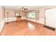 Bright living room features hardwood floors, fresh paint and large windows at 3515 Lindenwald Dr, Indianapolis, IN 46217