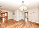Open-concept living space with hardwood floors, neutral walls, and recessed lighting fixtures at 3515 Lindenwald Dr, Indianapolis, IN 46217