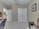 Neutral bedroom with carpet flooring, ceiling fan, and white closet doors at 3962 Kristi Way, Greenwood, IN 46142
