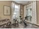 Versatile bonus room with exercise equipment, natural light, and neutral decor at 3962 Kristi Way, Greenwood, IN 46142