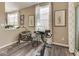 Bright bonus room with windows, exercise equipment, and stylish curtains at 3962 Kristi Way, Greenwood, IN 46142
