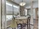 Cozy dining area with natural light and a view into another dining/kitchen area at 3962 Kristi Way, Greenwood, IN 46142