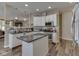 Stylish kitchen features modern appliances, dark countertops, and white cabinets at 3962 Kristi Way, Greenwood, IN 46142