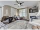 Cozy living room with a fireplace, plush rug, and ample seating, perfect for relaxation and entertaining at 3962 Kristi Way, Greenwood, IN 46142