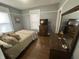 Bedroom featuring hardwood floors, natural light, and dresser at 4130 Rookwood Ave, Indianapolis, IN 46208