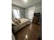 Bedroom featuring natural lighting, hardwood floors, and neutral color palette at 4130 Rookwood Ave, Indianapolis, IN 46208