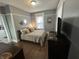 Bedroom featuring natural light, wood floors, dresser and neutral decor at 4130 Rookwood Ave, Indianapolis, IN 46208