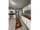 Well-lit kitchen featuring stainless steel appliances and ample counter space at 4130 Rookwood Ave, Indianapolis, IN 46208