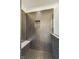 Modern bathroom boasts a tiled shower with built-in bench and niche at 430 N Keystone Ave, Indianapolis, IN 46201