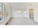 Bright bedroom featuring neutral carpeting, white walls, and a big window for lots of natural light at 430 N Keystone Ave, Indianapolis, IN 46201