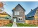 Attractive two-story home with a well-maintained lawn and a charming front entrance at 430 N Keystone Ave, Indianapolis, IN 46201