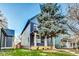 Charming two-story home with a landscaped yard and inviting porch at 430 N Keystone Ave, Indianapolis, IN 46201