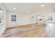 Spacious open-concept living area with wood floors and natural light at 430 N Keystone Ave, Indianapolis, IN 46201