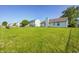 Expansive backyard with lush green lawn, perfect for outdoor activities and relaxation at 431 Alton Dr, Greenwood, IN 46143