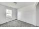 Bright bedroom with a window, fresh paint, and neutral carpeting at 431 Alton Dr, Greenwood, IN 46143