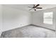 Cozy bedroom with neutral carpet, a bright window, and fresh paint at 431 Alton Dr, Greenwood, IN 46143
