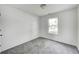 Cozy bedroom with neutral carpet, a bright window, and fresh paint at 431 Alton Dr, Greenwood, IN 46143