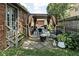 Cozy backyard featuring a dining area, string lights, and outdoor seating at 4901 N Kenwood Ave, Indianapolis, IN 46208