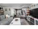 Finished basement with bar area, lounge space, and decorative ceiling tiles at 4901 N Kenwood Ave, Indianapolis, IN 46208
