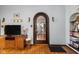 Living room view showcasing the arched doorway and a traditional design at 4901 N Kenwood Ave, Indianapolis, IN 46208
