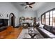 Inviting living room with hardwood floors, a fireplace, and plenty of natural light at 4901 N Kenwood Ave, Indianapolis, IN 46208