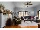 Living room featuring hardwood floors, fireplace and a large window at 4901 N Kenwood Ave, Indianapolis, IN 46208