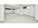 Finished basement area with neutral carpeting and recessed lighting at 5144 N College Ave, Indianapolis, IN 46205