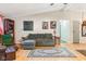 Cozy living room with hardwood floors, a comfortable couch, and an open layout at 5530 Pilgrim Dr, Indianapolis, IN 46254