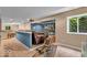 Finished basement featuring a movie setup, workout area, and a cozy bar area at 5865 Osage Dr, Carmel, IN 46033