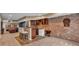Finished basement with bar area, complete with a dartboard, cabinets and seating at 5865 Osage Dr, Carmel, IN 46033