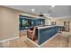Finished basement with plush seating, movie projector and screen, and workout area at 5865 Osage Dr, Carmel, IN 46033