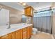 Bright bathroom with double vanity and neutral paint scheme at 5865 Osage Dr, Carmel, IN 46033