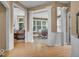 Spacious hallway with hardwood floors and an open floor plan at 5865 Osage Dr, Carmel, IN 46033