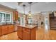Open kitchen and dining area blend seamlessly, offering space to entertain and enjoy time together at 5865 Osage Dr, Carmel, IN 46033