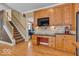 Open-concept space with desk area, stairs, and cabinets; great for working or studying from home at 5865 Osage Dr, Carmel, IN 46033