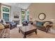 Living room showcases a fireplace, large windows and ample seating for relaxation at 5865 Osage Dr, Carmel, IN 46033