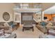Inviting living room with an overlook, cozy seating, and open entryway at 5865 Osage Dr, Carmel, IN 46033
