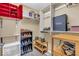 Organized walk-in closet with custom shelving and ample storage for shoes and accessories at 5865 Osage Dr, Carmel, IN 46033