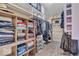 Well-organized walk-in closet with custom shelving, offering ample storage at 5865 Osage Dr, Carmel, IN 46033
