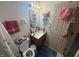 Bathroom featuring a vanity and toilet with blue rug at 5954 Honeywell Dr, Indianapolis, IN 46236