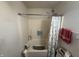 Bathroom featuring a shower-tub combo with red towel at 5954 Honeywell Dr, Indianapolis, IN 46236