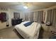 Bedroom with bed, dresser, and ceiling fan at 5954 Honeywell Dr, Indianapolis, IN 46236