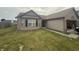 Attractive single-story house with brick and siding, complete with an attached two-car garage at 5954 Honeywell Dr, Indianapolis, IN 46236
