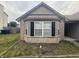 Home exterior featuring a bay window providing natural light and curb appeal at 5954 Honeywell Dr, Indianapolis, IN 46236